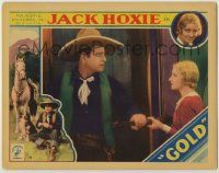 1k722 GOLD LC '32 close up of cowboy Jack Hoxie grabbing rifle from pretty Alice Day!