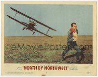 1k010 NORTH BY NORTHWEST LC #2 '59 Hitchcock, classic c/u of Cary Grant chased by crop duster!
