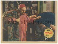 1k952 THINK FAST MR. MOTO LC '37 Asian detective Peter Lorre in disguise holding carpet by dead guy