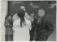 1s195 CHARADE  7.25x9.5 candid photo '63 Cary Grant standing while Donen talks to Audrey Hepburn!