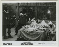 1s891 THREE MUSKETEERS 8x10.25 still '74 Raquel Welch is rousted from her bed by Richelieu's men!