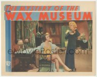 1y020 MYSTERY OF THE WAX MUSEUM LC '33 reporter Glenda Farrell smiles at scantily clad Fay Wray!