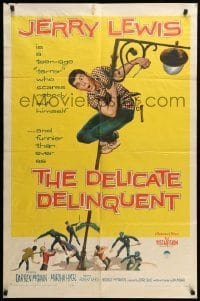 2b173 DELICATE DELINQUENT 1sh '57 wacky teen-age terror Jerry Lewis hanging from light post!
