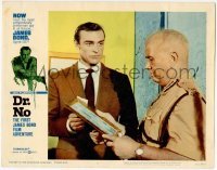 2d181 DR. NO LC #7 '62 close up of Sean Connery as James Bond asking guard about a picture!
