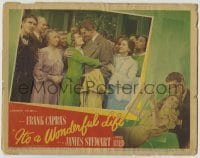 2d327 IT'S A WONDERFUL LIFE LC #5 '46 James Stewart hugging Donna Reed in crowd, Frank Capra!