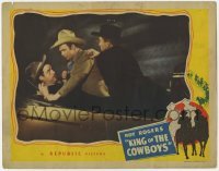 2d346 KING OF THE COWBOYS LC '43 c/u of Roy Rogers trying to disarm bad guy in convertible car!