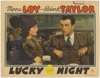 2d384 LUCKY NIGHT LC '39 Myrna Loy stares at Robert Taylor, who's mad he lost the fifty cents!