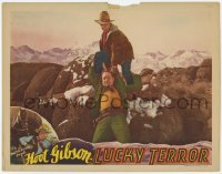 2d385 LUCKY TERROR LC '36 cowboy Hoot Gibson holds scared bad guy over the edge of a cliff!