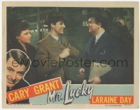 2d427 MR. LUCKY LC '43 Laraine Day w/ Cary Grant getting something from his jacket for Budd Fine!