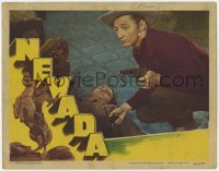 2d440 NEVADA LC '44 close up of Robert Mitchum with gun by dead guy, from Zane Grey's story!