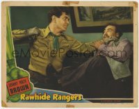 2d510 RAWHIDE RANGERS LC '41 great c/u of Johnny Mack Brown about to slug bad guy in the face!