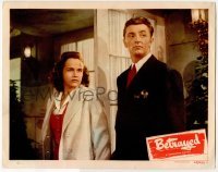 2d739 WHEN STRANGERS MARRY LC #2 R48 close up of young Robert Mitchum & Kim Hunter, Betrayed!