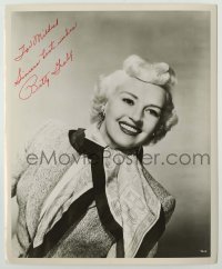 2j0447 BETTY GRABLE signed 8.25x10 still '40s great smiling portrait in wool dress & cool scarf!