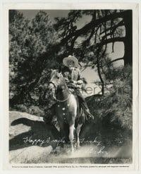 2j0453 BOB BAKER signed 8x10 still '40 great image of the cowboy actor riding his horse!