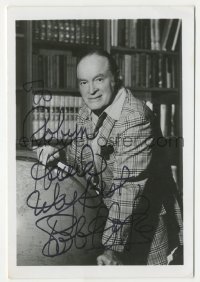 2j1055 BOB HOPE signed 5x7.25 REPRO still '80s great smiling close up posing by globe in library!