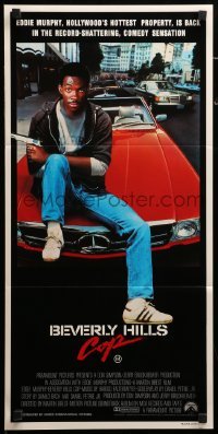 2r800 BEVERLY HILLS COP Aust daybill '85 great image of cop Eddie Murphy sitting on Mercedes!