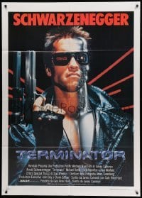 2s415 TERMINATOR Italian 1p '85 close up of classic cyborg Arnold Schwarzenegger with gun!