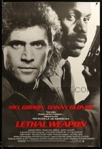 2t552 LETHAL WEAPON advance 1sh '87 great close image of cop partners Mel Gibson & Danny Glover!