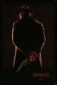 2t949 UNFORGIVEN teaser 1sh '92 image of gunslinger Clint Eastwood w/back turned, dated design!