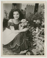2w277 DEBRA PAGET 8x10 still '40s kneeling in garden with a giant smile on her face!