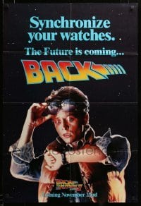 2z103 BACK TO THE FUTURE II teaser DS 1sh '89 Michael J. Fox as Marty, synchronize your watches!