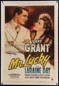 3a345 MR. LUCKY linen 1sh '43 great art of gambler Cary Grant smiling at pretty Laraine Day!