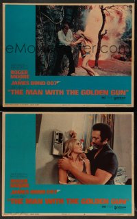 3g927 MAN WITH THE GOLDEN GUN 2 West Hemi LCs '74 Roger Moore as James Bond, Britt Ekland, explosion