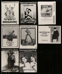 3h344 LOT OF 8 UNCUT PRESSBOOKS '70s-80s advertising images for a variety of different movies!