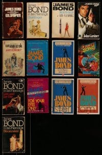 3h376 LOT OF 13 JAMES BOND PAPERBACK BOOKS '60s-90s Goldfinger, Live & Let Die + many more!