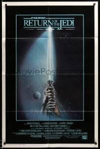 3p704 RETURN OF THE JEDI int'l 1sh '83 George Lucas, art of hands holding lightsaber by Tim Reamer!