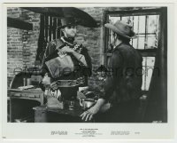 3s266 FOR A FEW DOLLARS MORE 8x10.25 still '67 c/u of Clint Eastwood putting cash in satchel!