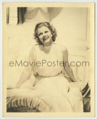 3s408 JEAN HARLOW deluxe 8x10 still '30s laughing portrait seated on couch in sleeveless dress!