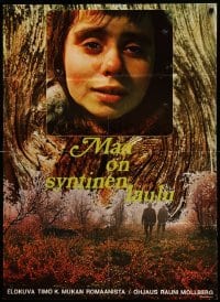 3t023 EARTH IS A SINFUL SONG Finnish '73 close-up up of super sad Maritta Viitamaki over forest!