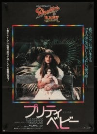 3t937 PRETTY BABY Japanese '78 directed by Louis Malle, young Brooke Shields sitting with doll!