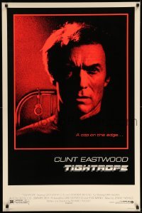 3w895 TIGHTROPE 1sh '84 Clint Eastwood is a cop on the edge, cool handcuff image!
