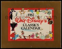 3y322 WALT DISNEY 11x14 calendar '82 each month has a scene from a classic feature cartoon!