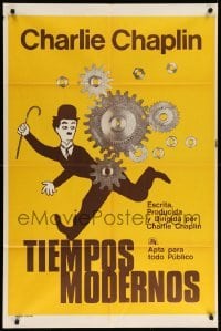 4f487 MODERN TIMES Argentinean R70s great artwork of Charlie Chaplin running by giant gears!