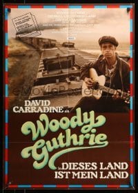 4g209 BOUND FOR GLORY German '76 David Carradine as folk singer Woody Guthrie on top of train!