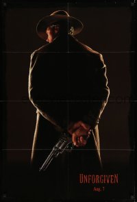 4j932 UNFORGIVEN teaser DS 1sh '92 image of gunslinger Clint Eastwood w/back turned, dated design!