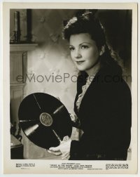 4m424 GUEST IN THE HOUSE 8x10.25 still '44 close up of pretty Anne Baxter holding vinyl record!