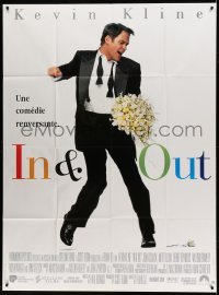 4p737 IN & OUT French 1p '97 Frank Oz, great image of Kevin Kline dancing w/flowers!