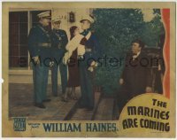 4s749 MARINES ARE COMING LC '34 Armida wearing furs doesn't want to let William Haines go!