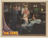 4s867 SIN TOWN LC '42 Constance Bennett & Charles Wagenheim stare at Broderick Crawford in chair!