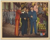 5c126 CHARLIE CHAN AT THE CIRCUS LC '36 Warner Oland & Keye Luke standing with men by audience!