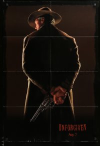 5f949 UNFORGIVEN teaser DS 1sh '92 image of gunslinger Clint Eastwood w/back turned, dated design!