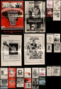 5h310 LOT OF 25 CUT PRESSBOOKS '50s-70s great advertising for a variety of different movies!