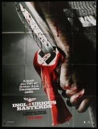 5k758 INGLOURIOUS BASTERDS teaser French 1p '09 Tarantino, c/u of swastika armband on bloody knife!