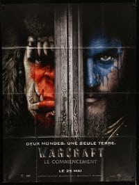 5k977 WARCRAFT teaser French 1p '16 great close up of orc and human split between a sword!
