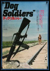 5p996 WHO'LL STOP THE RAIN Japanese '78 cool image of assault rifle buried on train tracks!