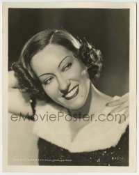 5s329 GLORIA SWANSON 8x10.25 still '30s smiling portrait wearing fur-trimmed sequin outfit, rare!